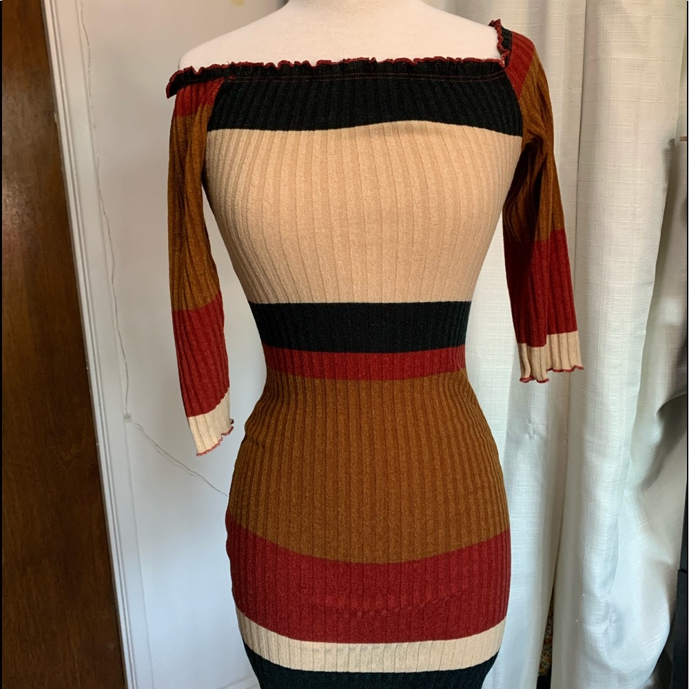 Neutral colored dress. Off the shoulders